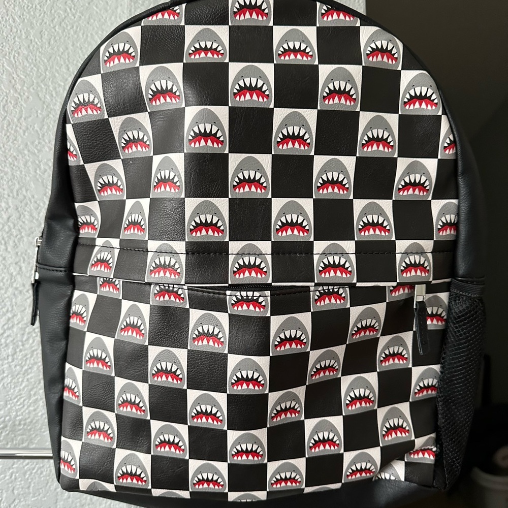 Black and White vinyl backpack